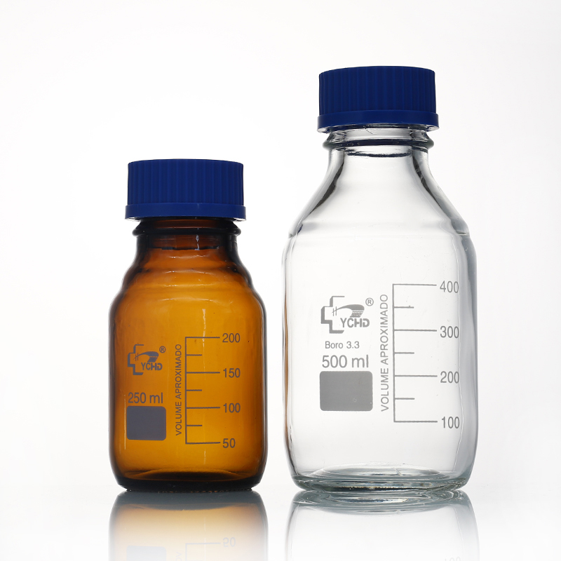 Clear and amber glass media bottles with blue GL45 screw caps